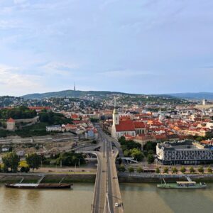 a view of a city with a bridge over a river